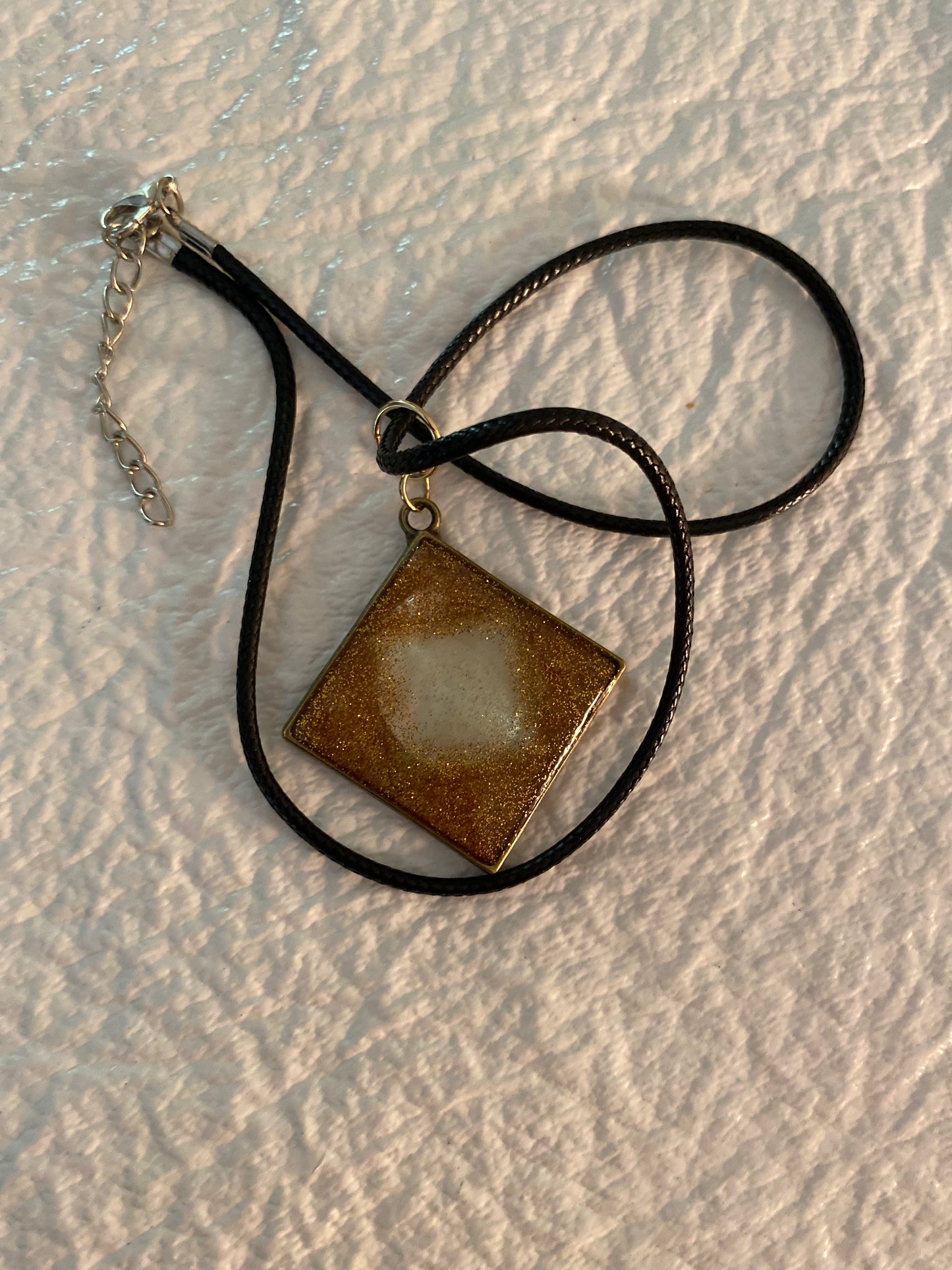 Diamond bezel necklace with quartz inside