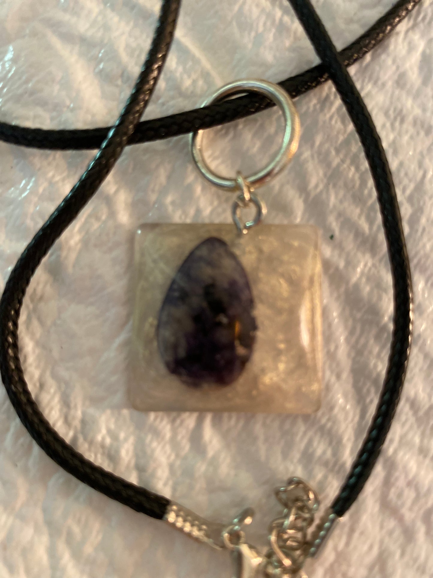 Dyed gem stone in resin