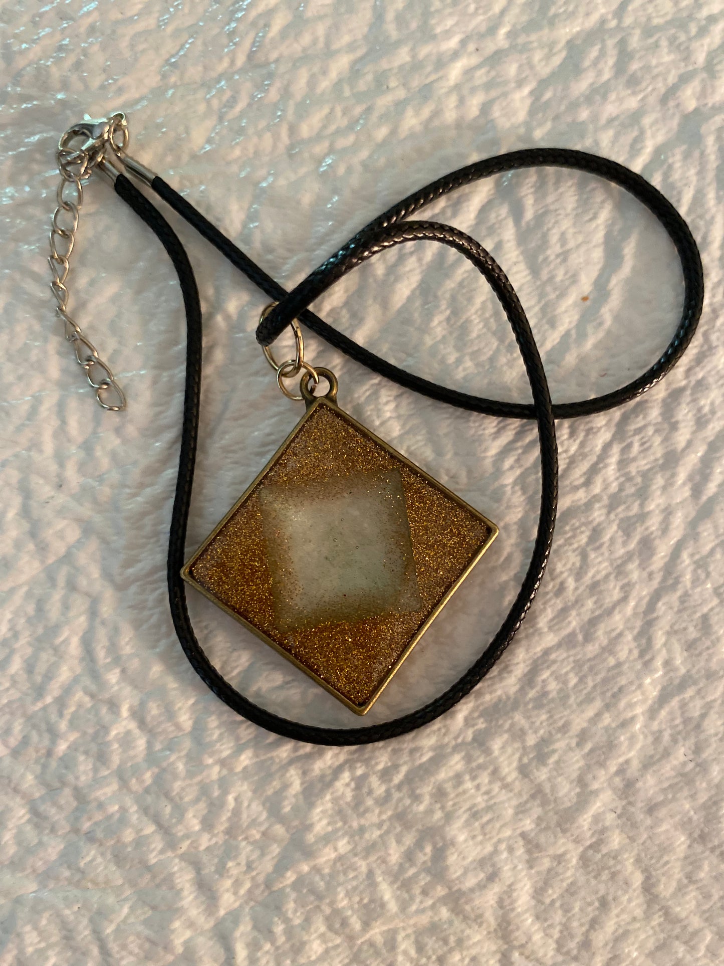 Diamond bezel necklace with quartz inside