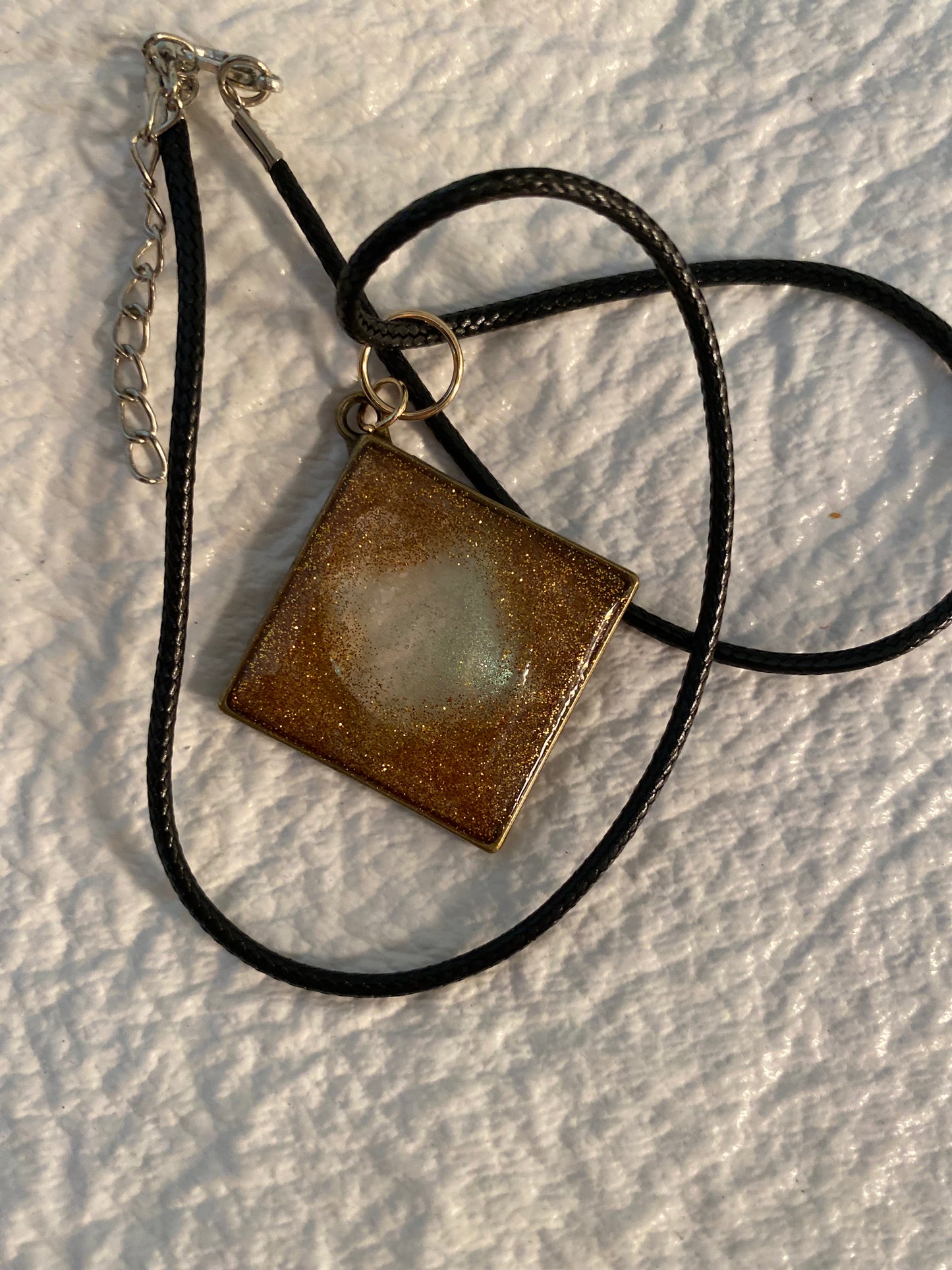 Diamond bezel necklace with quartz inside