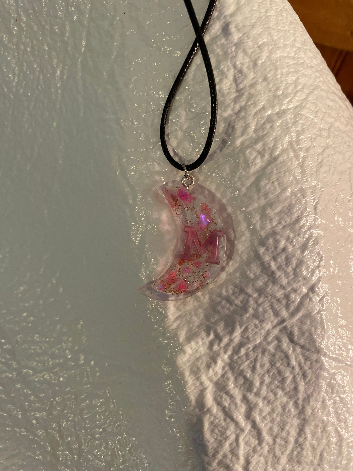 Crescent moon with an M necklace