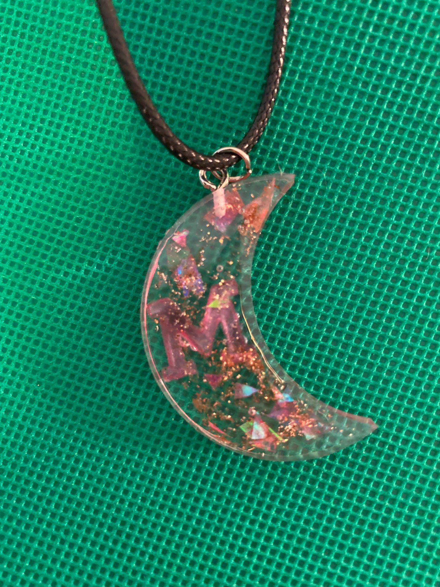 Crescent moon with an M necklace