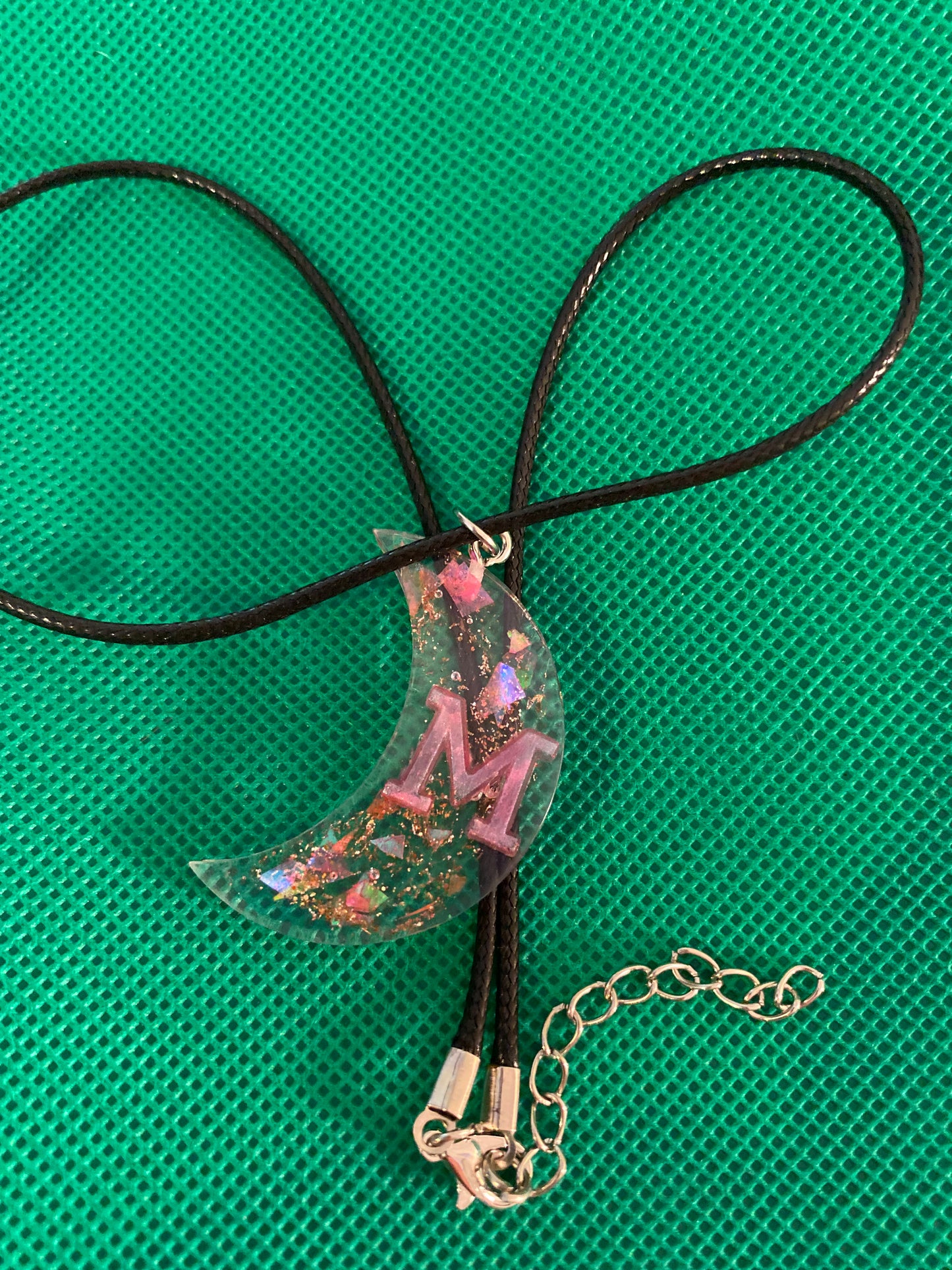 Crescent moon with an M necklace