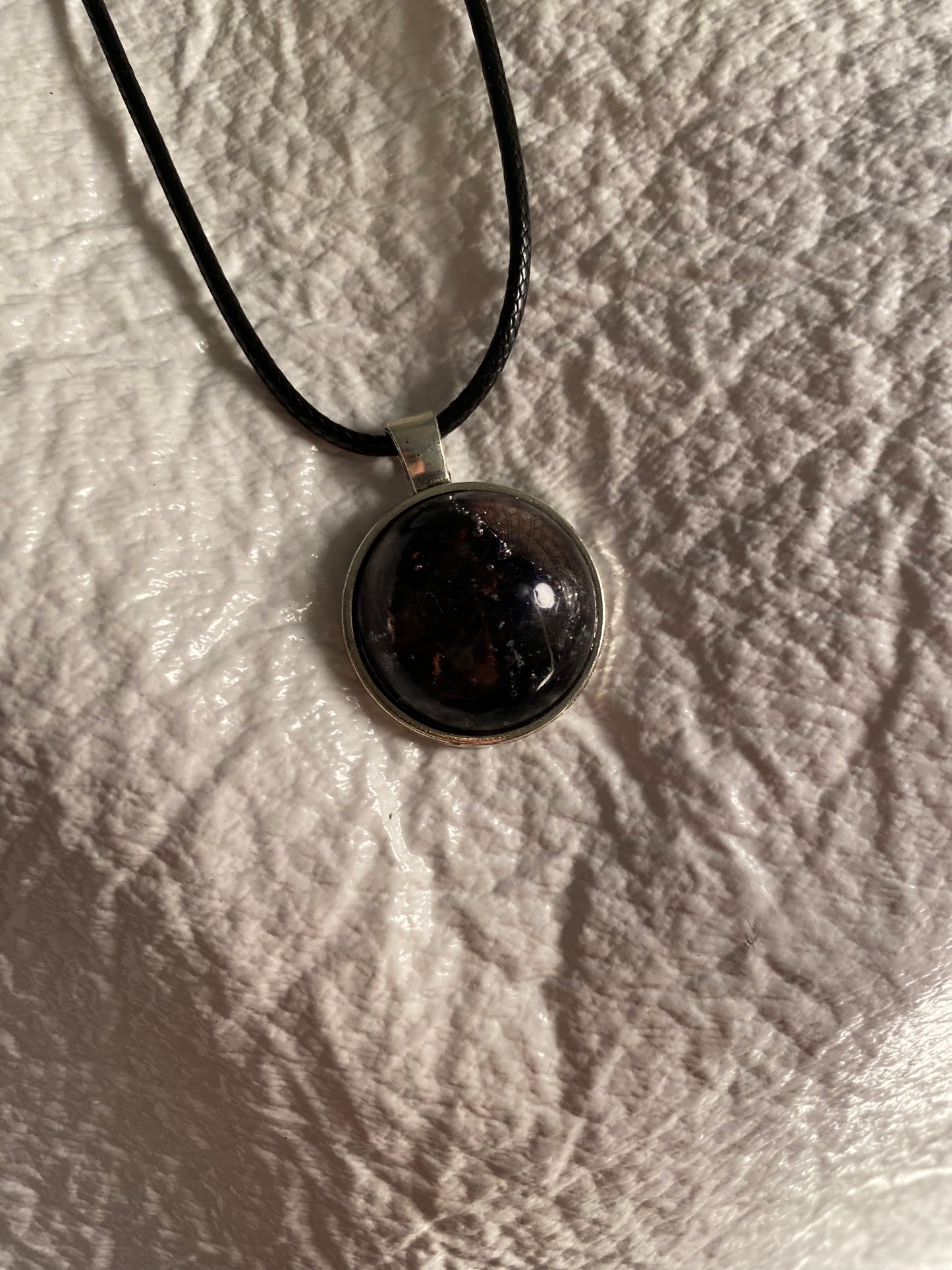 Micah in round bezel pendant