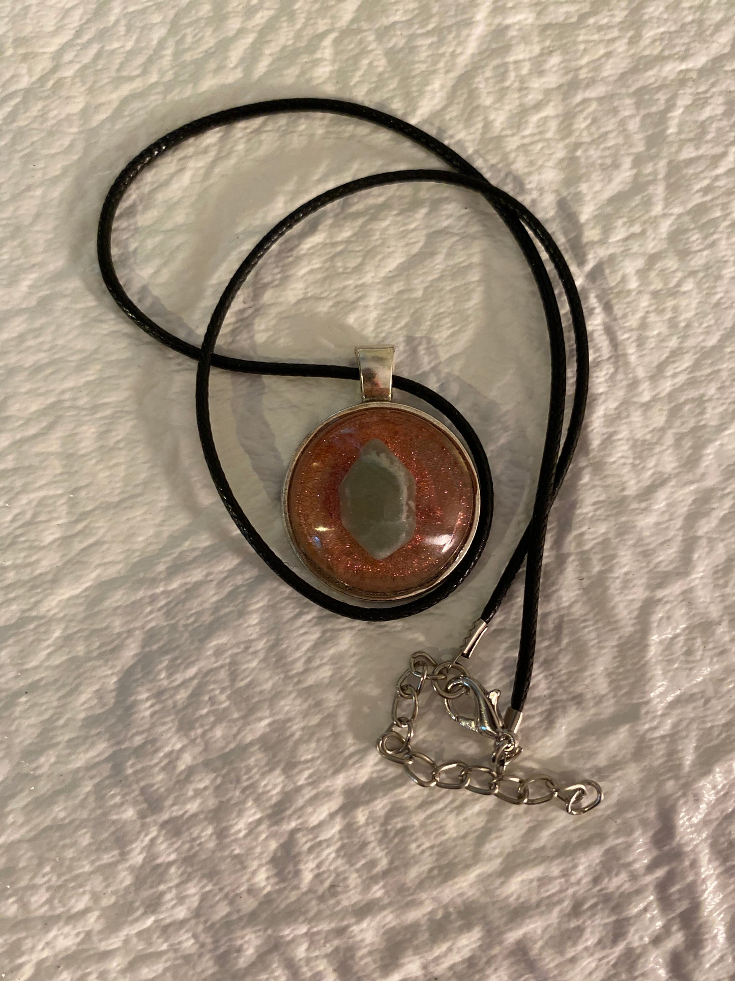 Gem stone in round bezel pendant