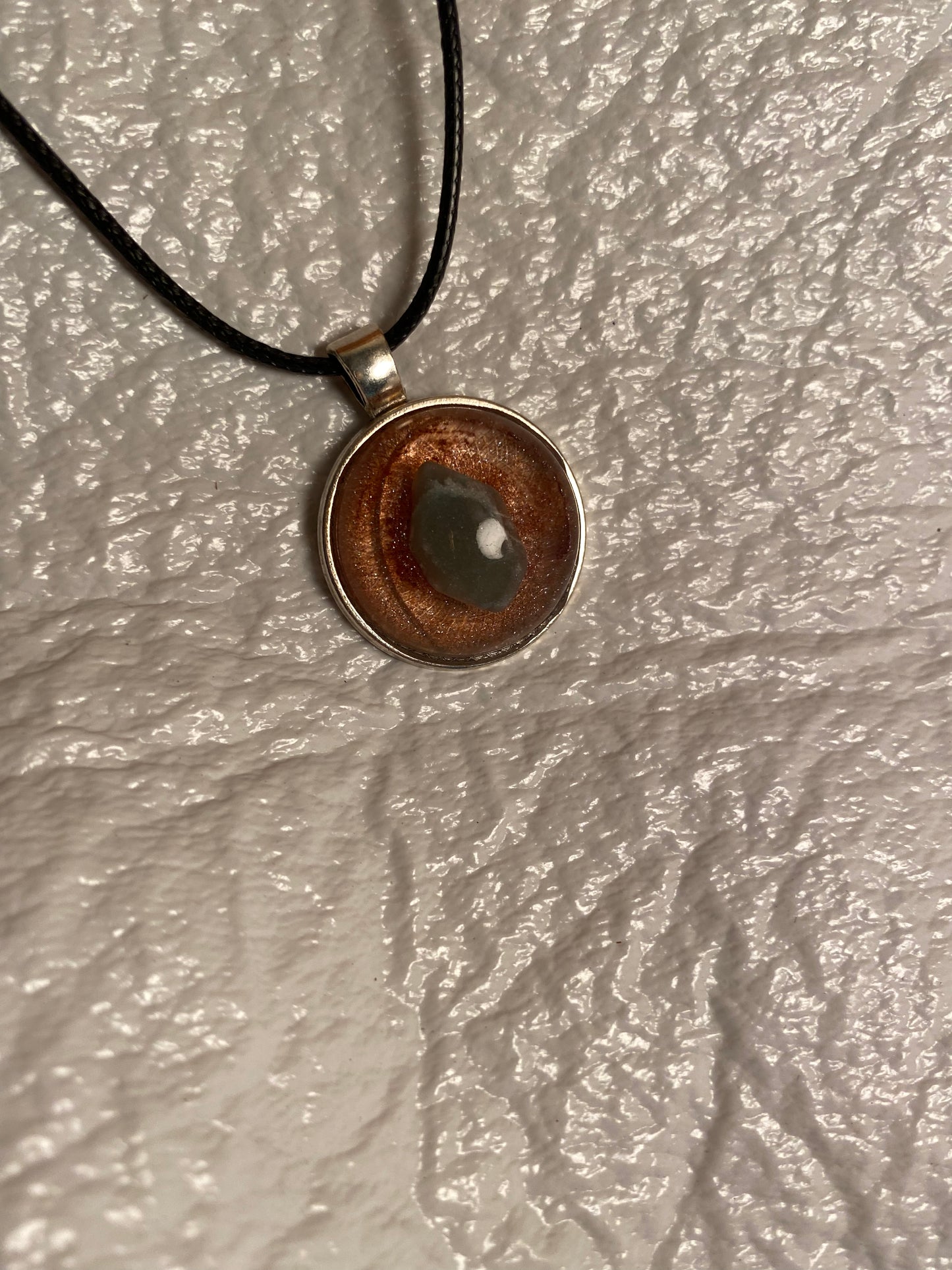 Gem stone in round bezel pendant