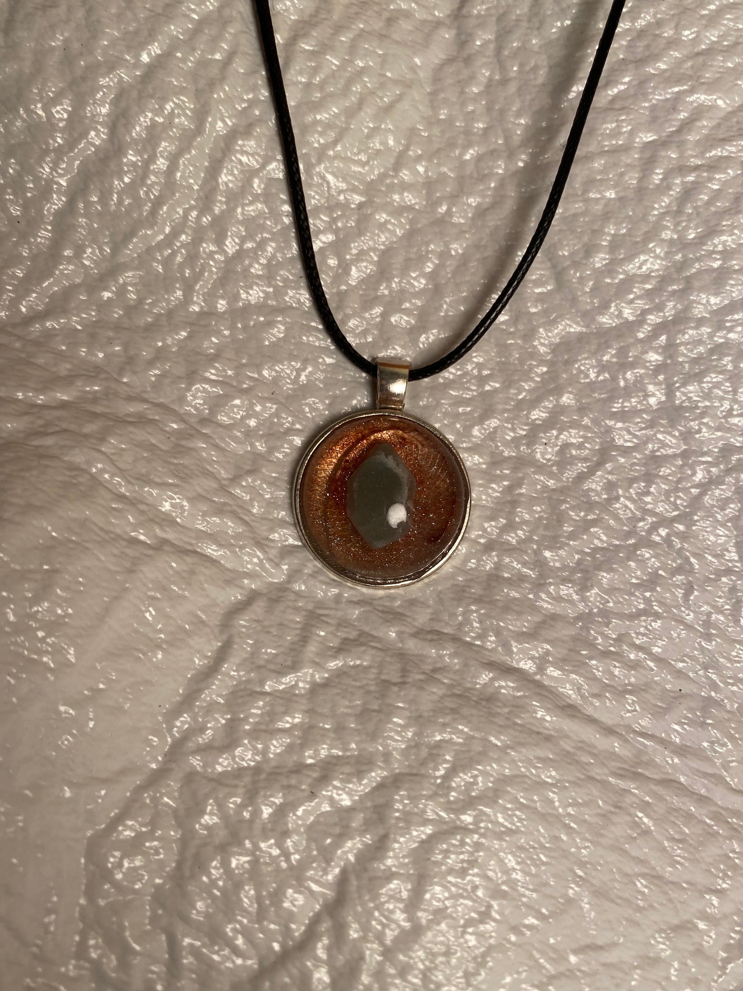 Gem stone in round bezel pendant