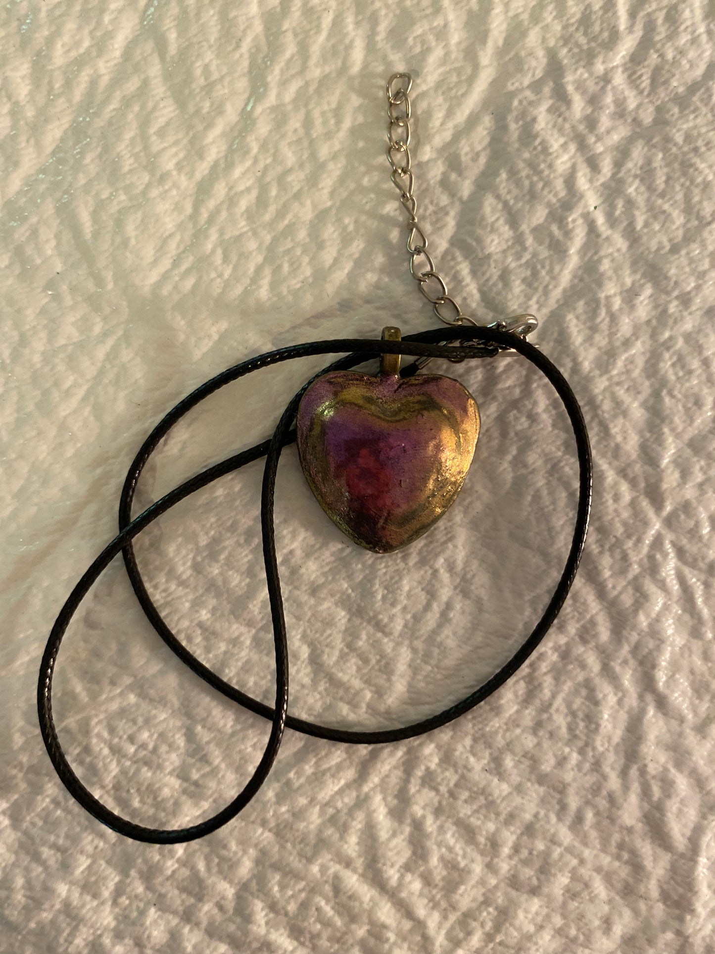 Metallic heart pendant