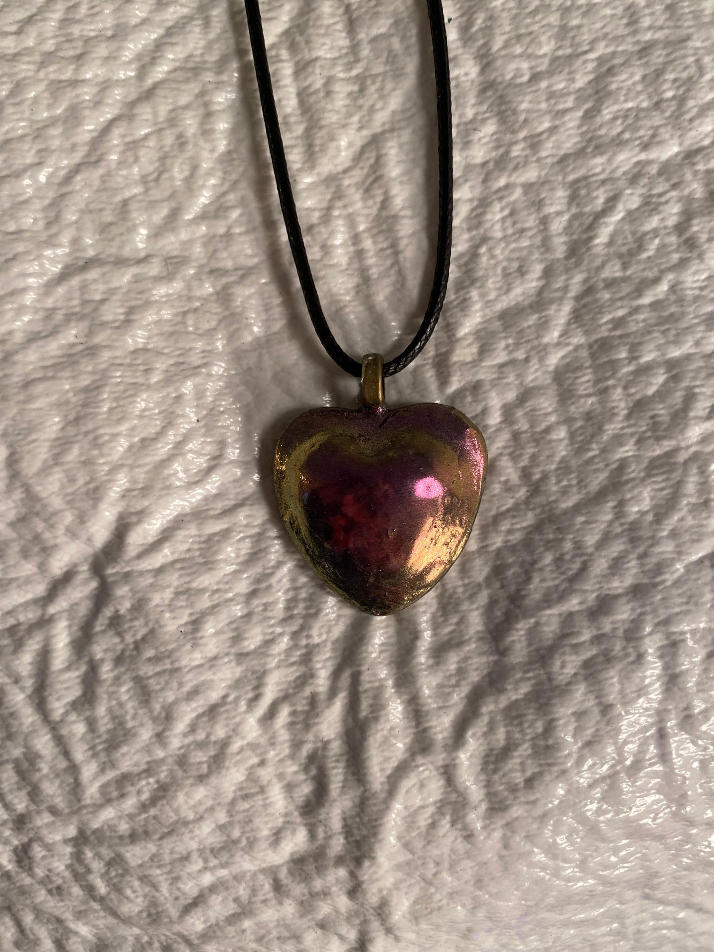 Metallic heart pendant