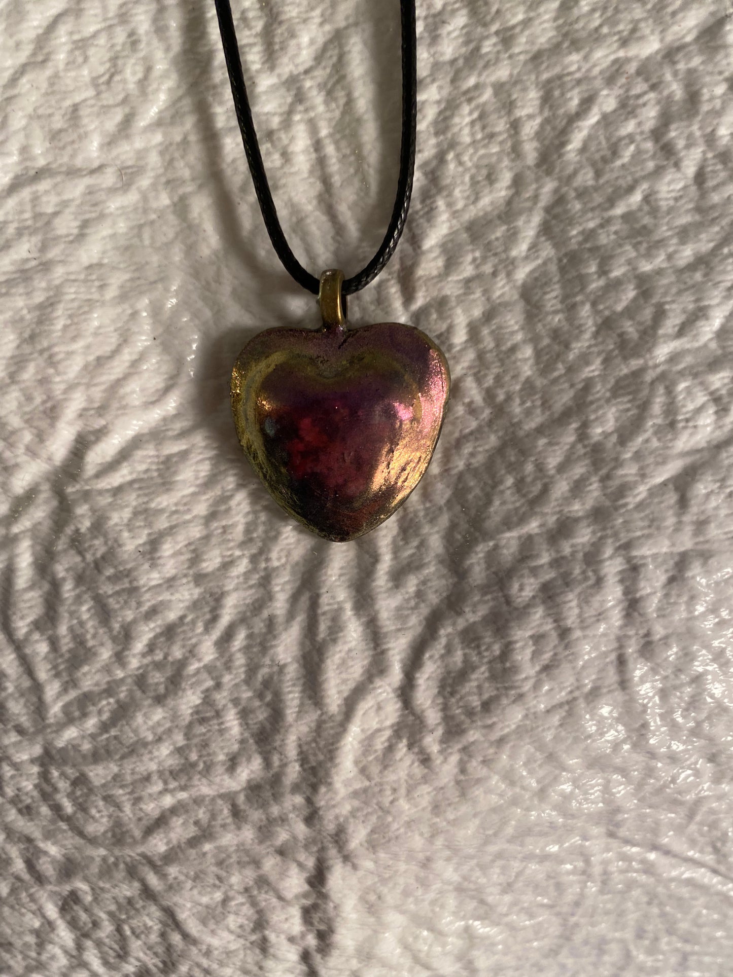 Metallic heart pendant