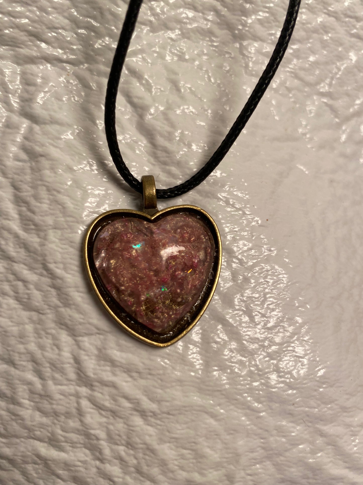 Pink swirl heart bezel pendant