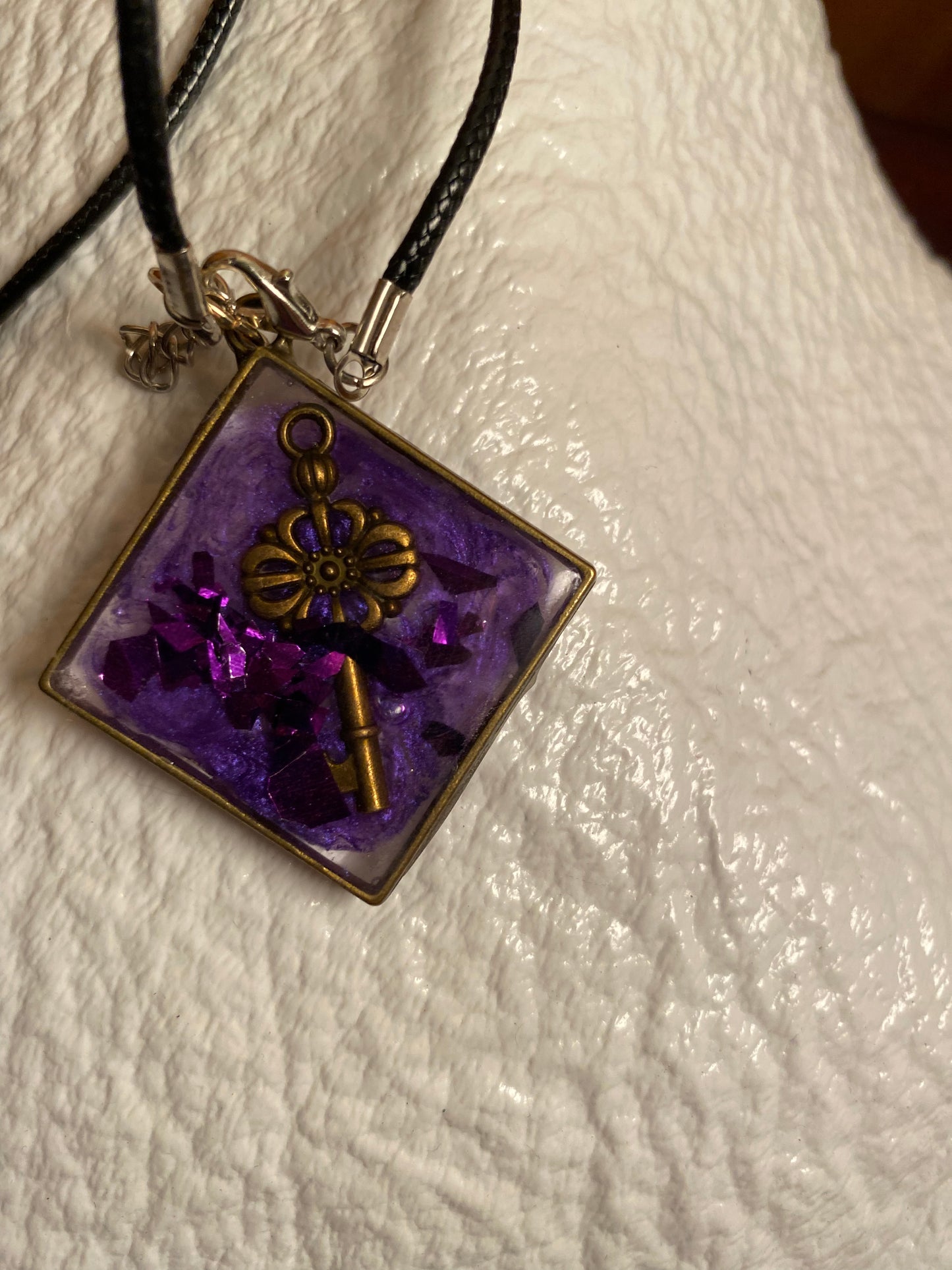 Key in purple diamond