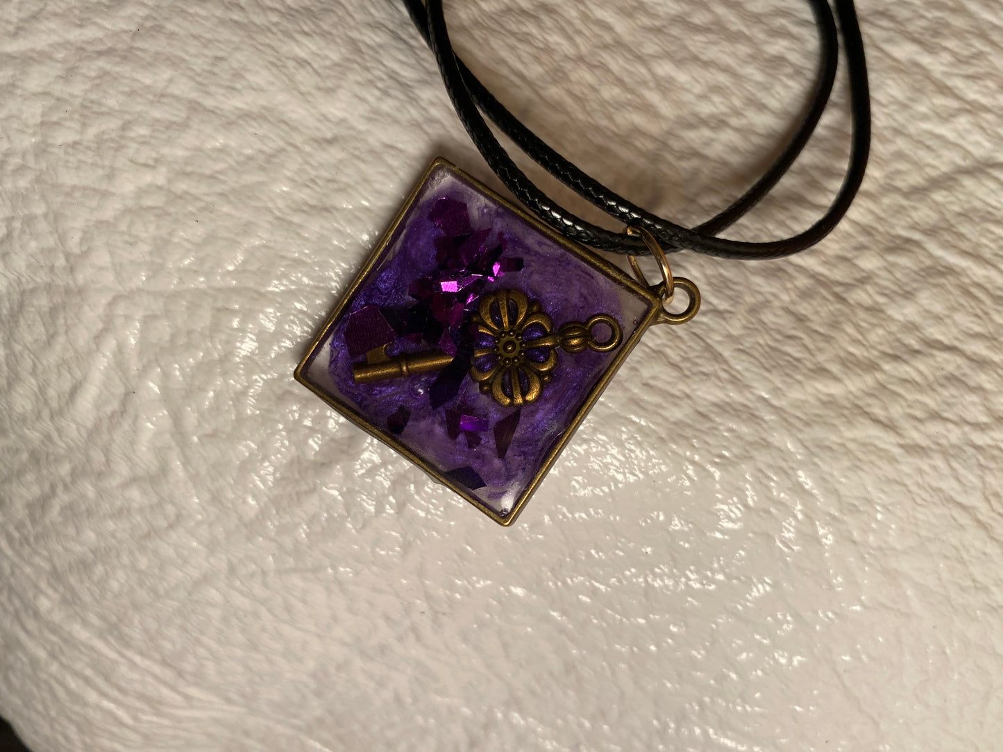 Key in purple diamond